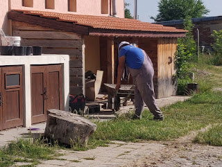 Halil shifts the last of the firewood