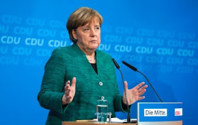 Socialdemócratas alemanes aprueban coalición con Merkel