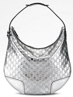 beautiful designer handbags are made from many materials like leather ...