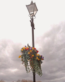 Attractive hanging baskets are adding colour in Brigg near the River Ancholme - picture on Nigel Fisher's Brigg Blog