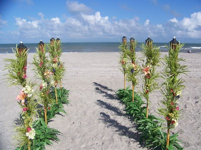 Beach ceremony wedding arbor and all beach wedding decor created by Joanie 