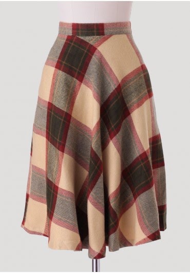 http://shopruche.com/get-a-clue-plaid-midi-skirt-by-pink-martini.html