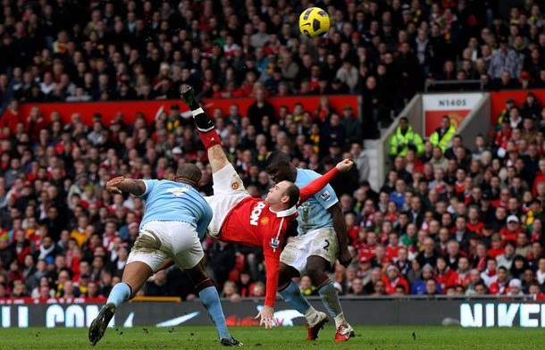 Manchester United striker Wayne Rooney scores the winning goal with an overhead kick against Manchester City