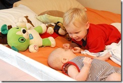 Troy and Justin in big bed