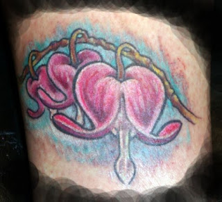 flower heart tattoos