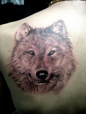 Another tattoo with wolf. This tattoo obviously requires a lot of body 