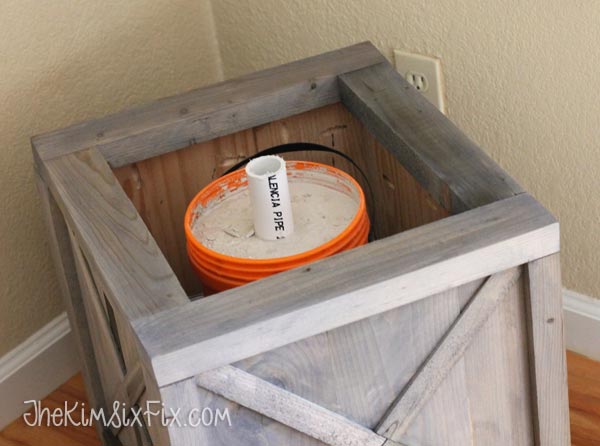 Concrete tree stand inside box