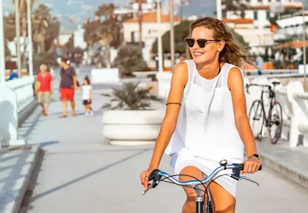 A girl cycling in europe