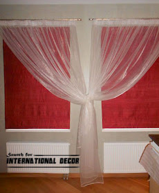 Roman blinds designed of red silk fabric