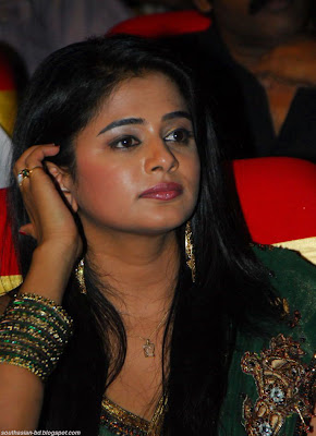 Priyamani in a Green Designer Saree with a Sleeveless Blouse