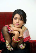 Nidhi Natuiyal Glamorous Photos in Saree-thumbnail-14