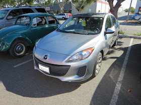 2013 Mazda 3 with new bumper and factory paint from Almost Everything Auto Body.
