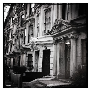 Houses and apartments on a street in Manhattan, New York City