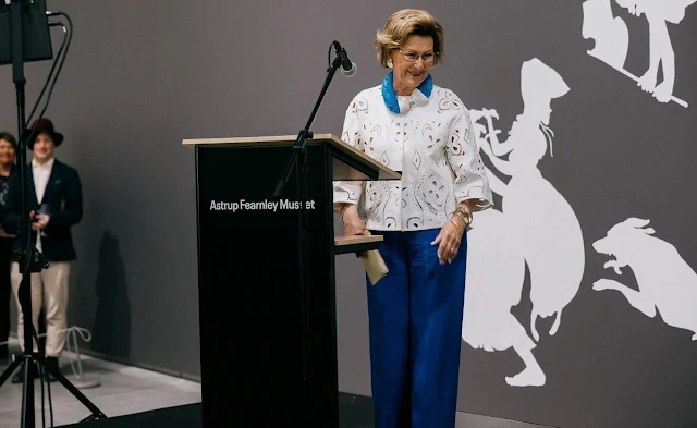 Queen Sonja wore a royal blue jumpsuit and white lace top. Hans Rasmus Astrup. Astrup Fearnley Collection