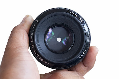 how to lock aperture of a lens at a certain setting