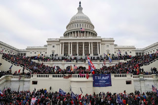 Lawmakers Joe Biden's victory in the US presidency and the presidential confirmation meeting, a large group of Trump supporters gathered and stormed the US Congress building-