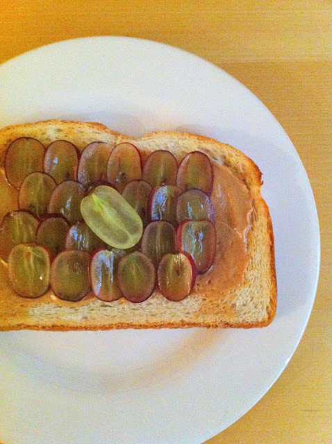 Art of Toast with peanut Butter and Grape Slices