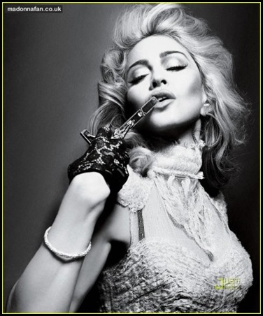 450_madonna-interview-magazine-crucifix-arms-492881768