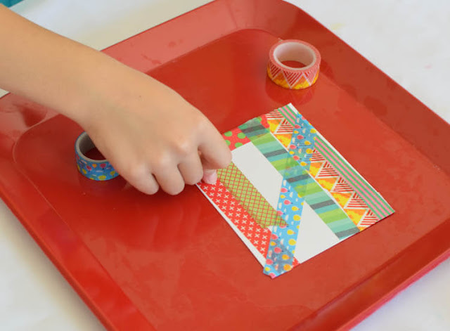 Washi Tape Flowers- Quick and easy craft for kids. Fun fine motor work for spring, great for preschool, kindergarten, or elementary children.