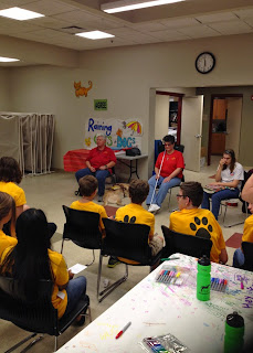 Audrey, Jessie, Laurel and Shelby presenting for Bark Camp