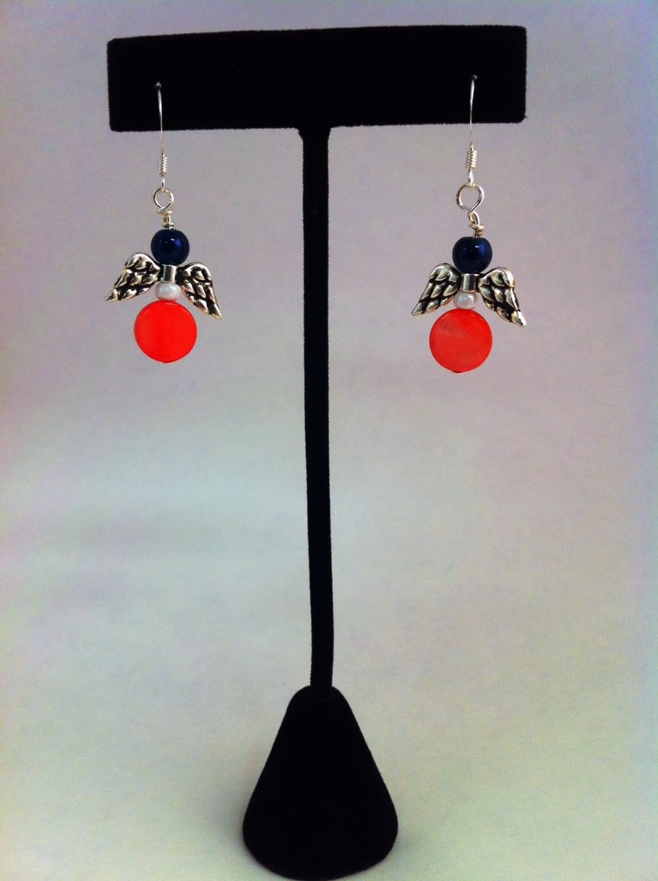 https://www.etsy.com/listing/181123820/angel-coral-and-navy-silver-earrings