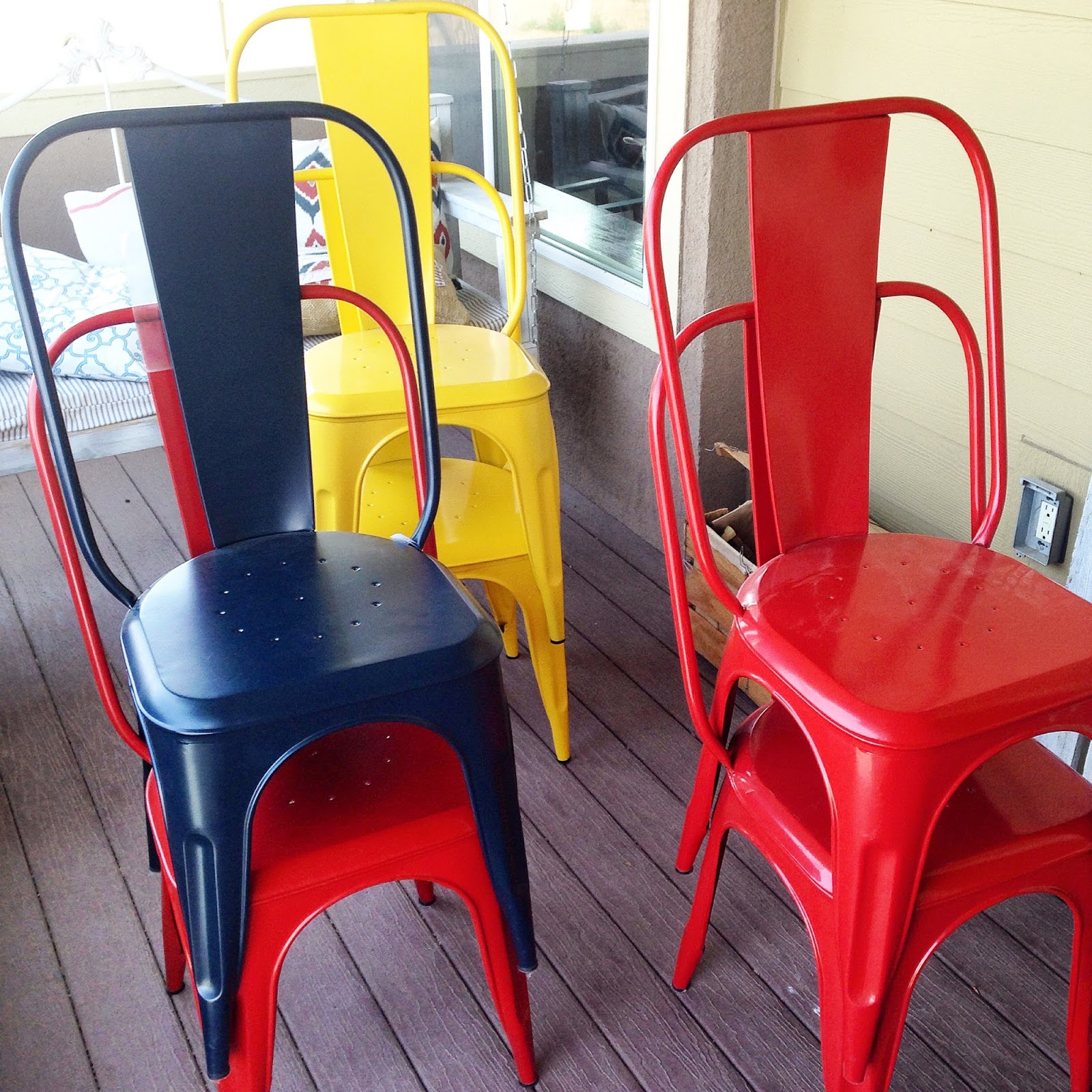 Red , yellow , blue metal chairs