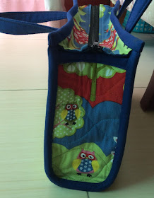 Side view/panel of the bag