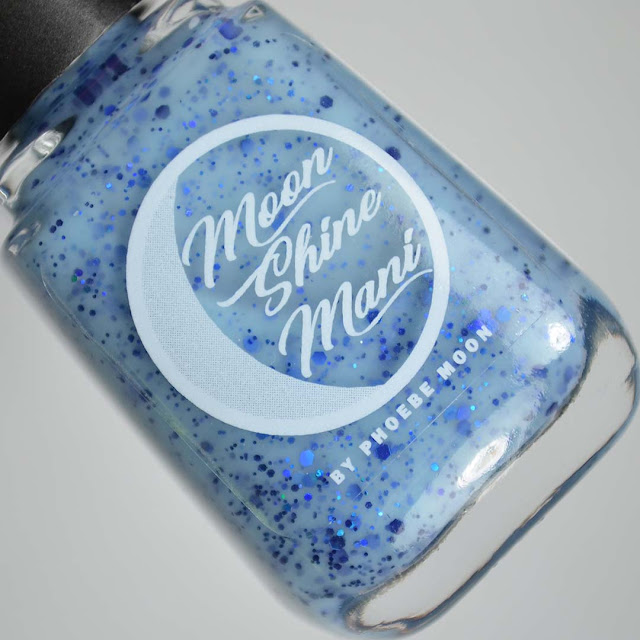 light blue nail polish with blue glitter