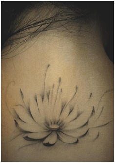 flower tattoo back of neck