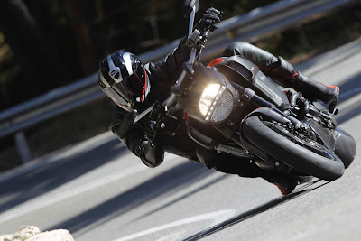 NEW  DUCATI  MOTORCYCLE  2011  DIAVEL  CARBON  FRONT  ACTION  VIEW