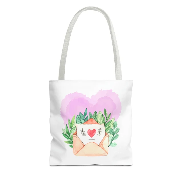 Tote Bag With Watercolor Valentine's Day Envelope Containing a Letter, Green Leaves, and Purple Heart In the Background