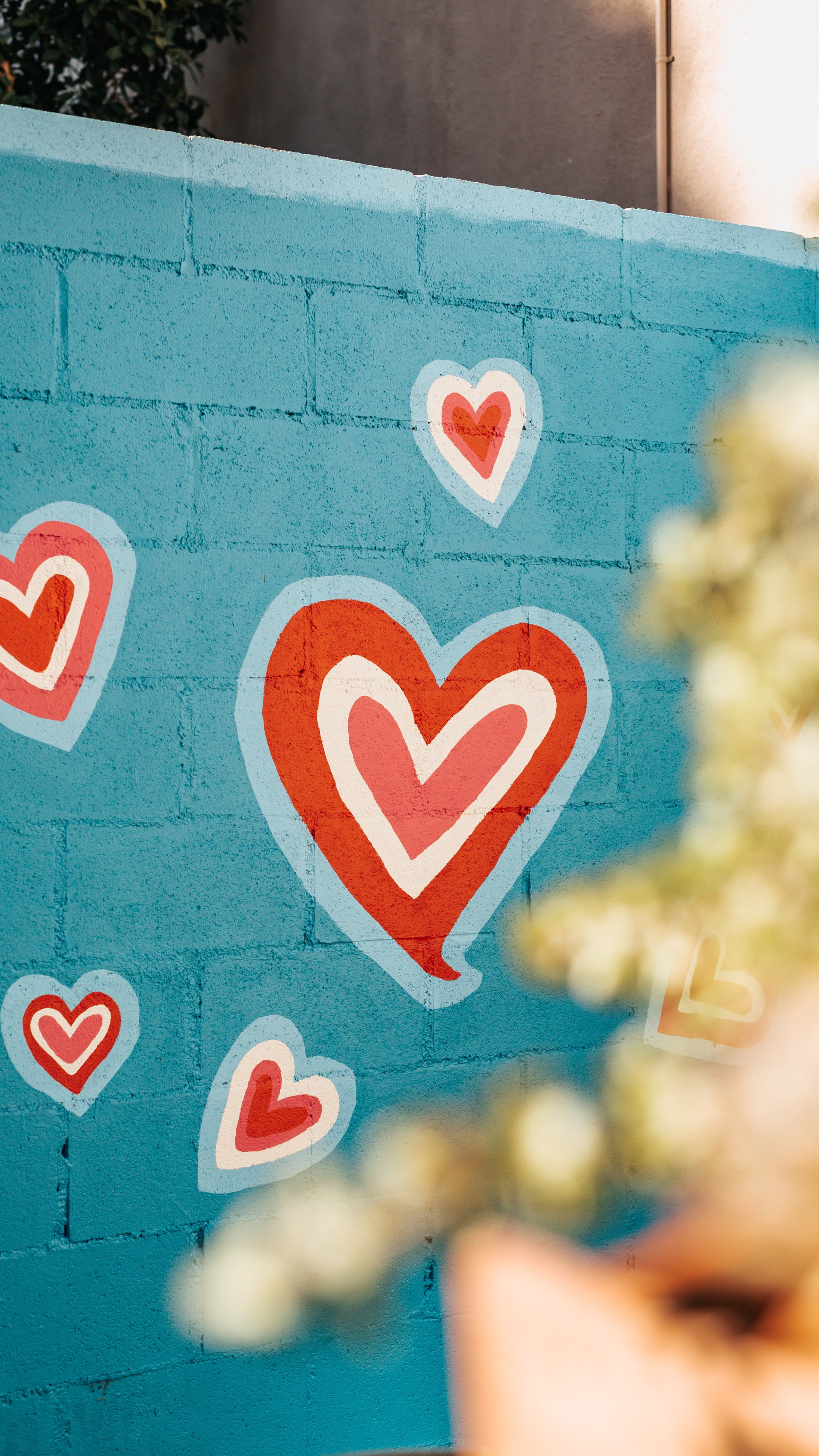 Red and White Hearts Grafiti Photo | Photo by Tyler Nix via Unsplash