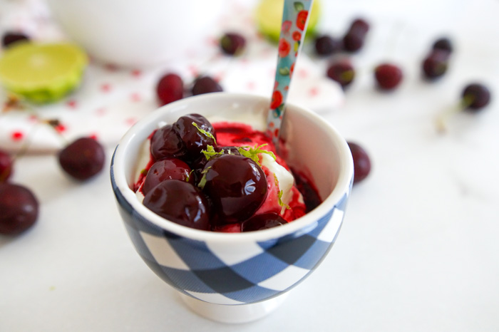 Cherry Limeade Compote over greek yogurt in gingham bowl