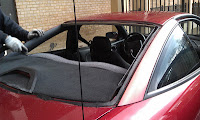 1999 Chevrolet Cavalier coupe receives new windshield due to Hurricane Sandy