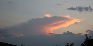 Evening light on a distant cloud