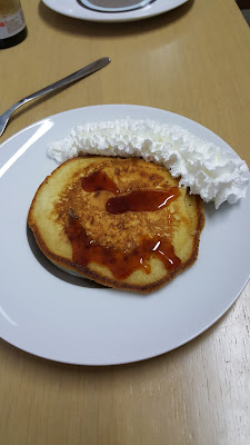 Pancakes with whip cream afros