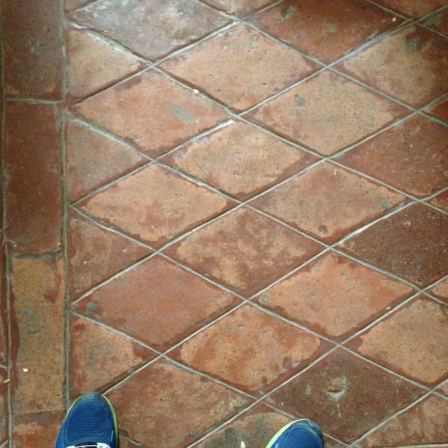 Rare brick baldosas or earthenware floor tiles of various geometric shapes (e.g. octagon, hexagon, quadrilaterals and triangles) form patterns with a distinct red hue that articulate the ground floor pavement of the church nave and part of the convento
