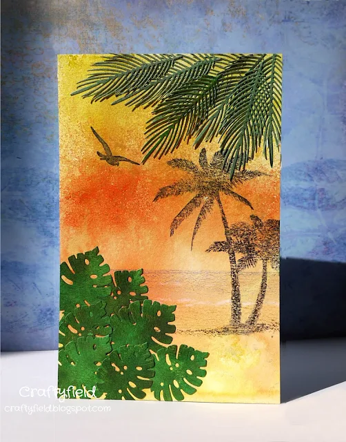 Beach scene created with stamps and dies