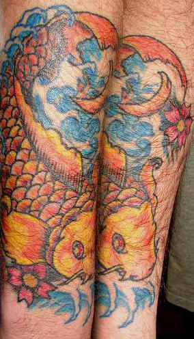 Koi fish leg tattoo