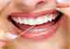 <Img src ="Hilo-dental-entre-dientes.jpg" width = "128" height "70" border = "0" alt = "Fotos del hilo dental.">