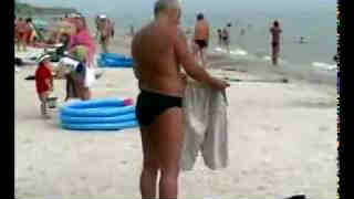 Funny Drunker changing dress in Beach