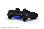 With this newly designed controller with touch pad in the middle and a . (sony playstation reveal )