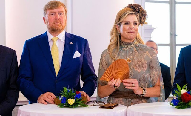 Queen Maxima wore a floral print tulle dress by Natan. President Alexander van der Bellen and Doris Schmidauer