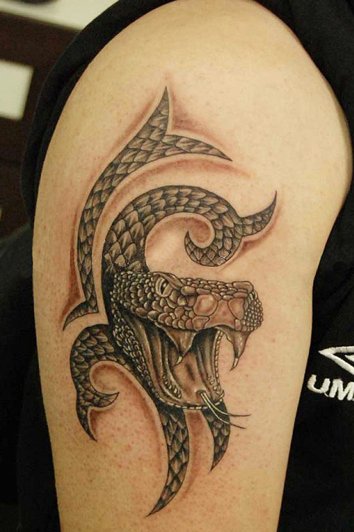 The fourth of my Tribal Snake Tattoos is my fav tattoo design so far