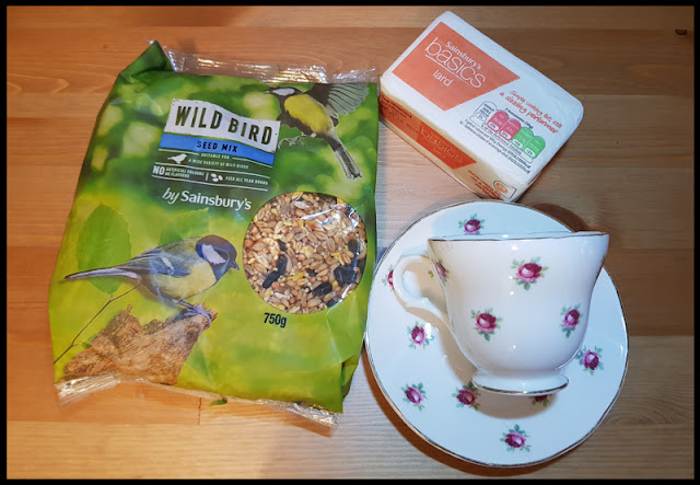 Old tea set, lard and bird seed make a unique bird feeder for the garden