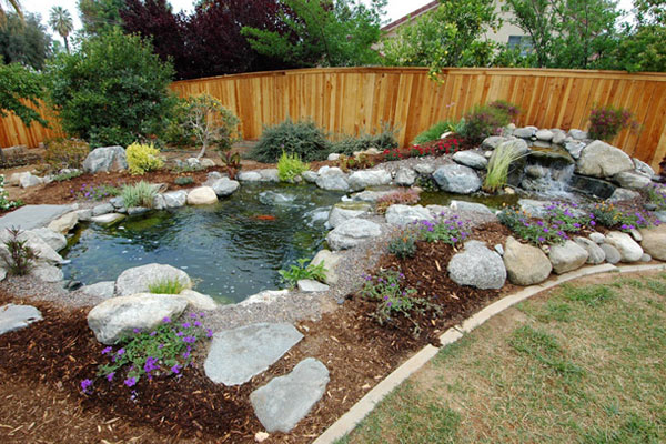 landscape design for a small backyard Small Backyard Pond Landscaping Ideas | 600 x 400