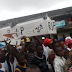 SUPPORTERS WELCOME GOV. BEN AYADE WITH COFFIN! 