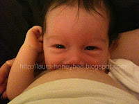 Happy breastfeeding baby