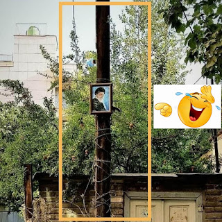 Taggtråd runt elstolpen så att någon inte tar ner bilden av den kriminella Khamenei, hur roliga och skrämmande de är