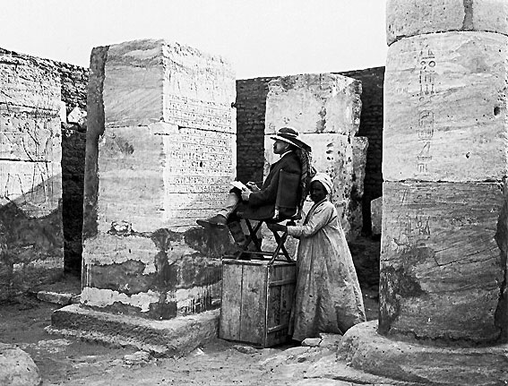 SUDAN (NUBIA):  Buhen - James Henry Breasted copying inscriptions of king Thutmose III (ca. 1500 B.C.) in the Temple of Horus. Photograph by Friedrich Koch, photographer of the Egyptian Expedition of the University of Chicago, January 1906